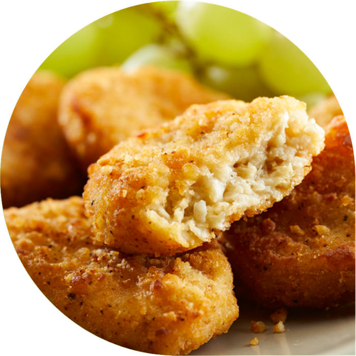 Close-up of golden brown Rebellyous vegan nuggets.