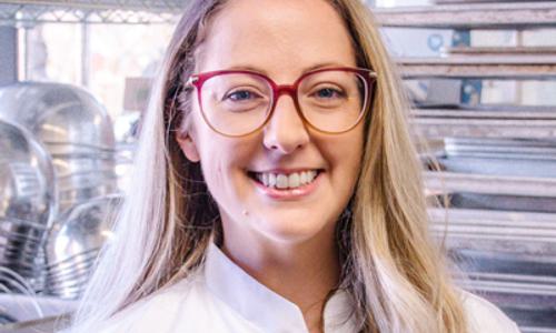 Innovative culinologist experimenting with molecular gastronomy techniques for new food textures.